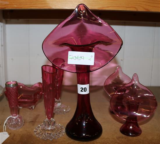 Collection cranberry glass including three Jack in the Pulpit vases